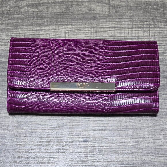 BCBG Handbags - BCBG Purple Scales Trifold Wallet - New